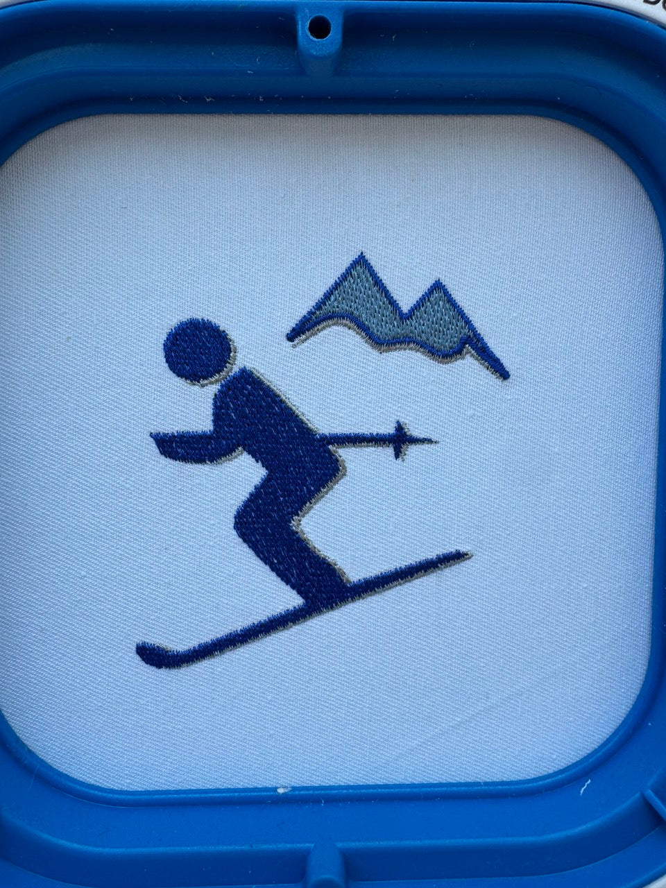 The Women’s Crew Neck Sweatshirt: Embroidery with a Skier in Motion